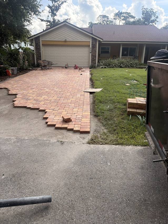 Laying paver stones on the prepared base